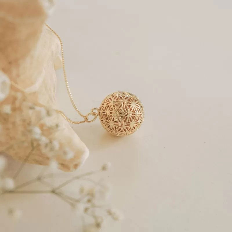 Bola de grossesse Fleur de vie | Sur chaine jaune