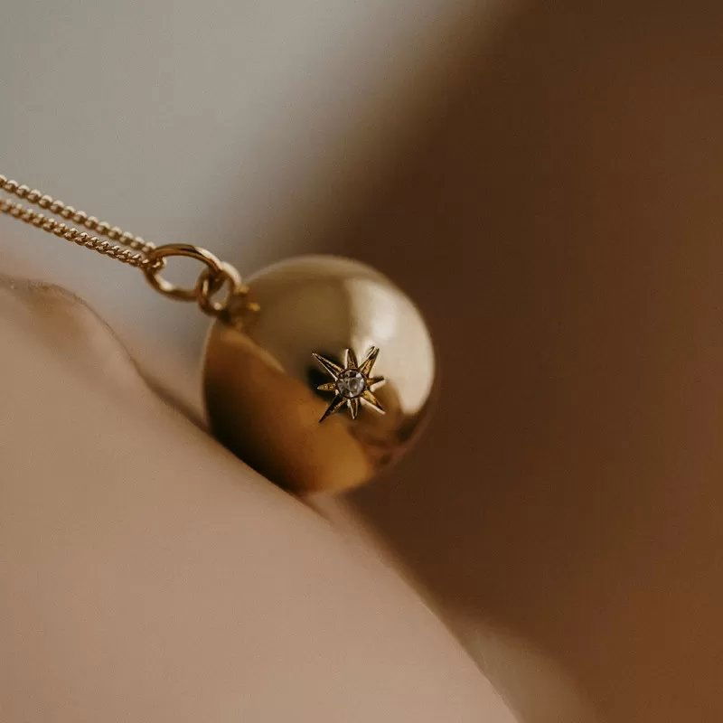 Bola de grossesse Etoile | Finition Or + chaine perlée