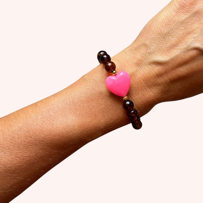 Bracelet perles ambrées - Coeur rose