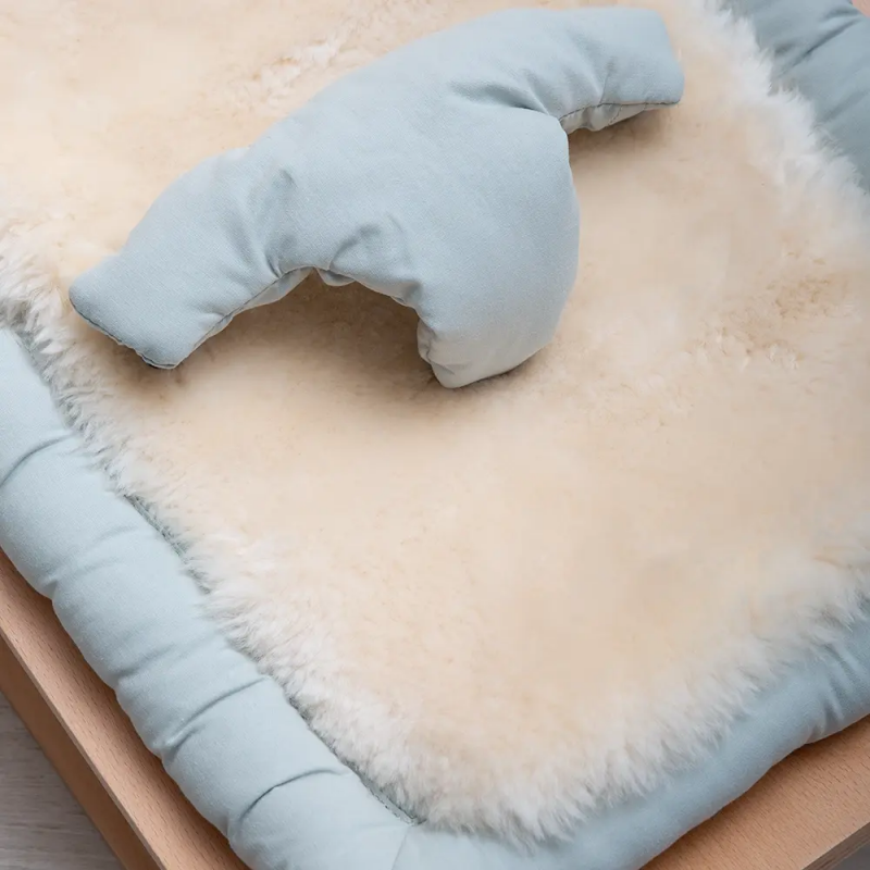 Peau de mouton pour transat bébé | Milk