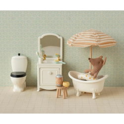 Petit frère souris avec bouée à pois jaunes