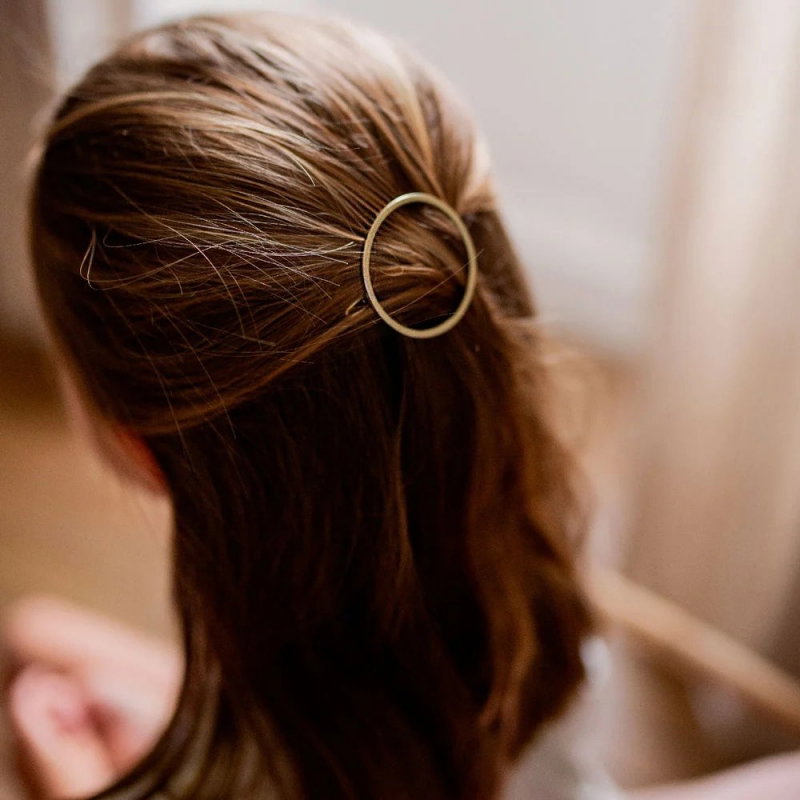 Barrette à cheveux ronde dorée